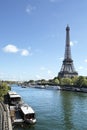 Eiffel Tower vertical landscape, river seine and boats, copy space, vertical