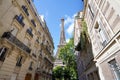 The Eiffel Tower view between palaces in Rue de l`UniversitÃÂ© street, 7th arrondissement, Paris, France Royalty Free Stock Photo