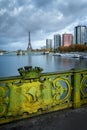 Eiffel tower, view from Pont Mirabeau with the coat of arms od the city of Paris France