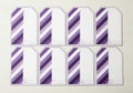 Eight blank gift tags with purple and white diagonal stripes isolated on white background Royalty Free Stock Photo