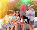 Eight children are talking about play on walk in the park Royalty Free Stock Photo