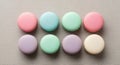 Eight colorful macarons are arranged in Royalty Free Stock Photo
