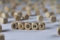 Eight - cube with letters, sign with wooden cubes Royalty Free Stock Photo