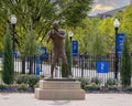 Eight-foot tall bronze statue of Glenn Dobbs on the campus of Tulsa University in Tulsa, Oklahoma. Royalty Free Stock Photo