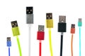 Eight multicolored usb cables are arranged vertically, on a white isolated background. The family unites. future technologies. Hor Royalty Free Stock Photo