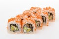 Eight pieces of california roll with tiger shrimp in caviar. Sushi with cucumber and cream cheese inside isolated Royalty Free Stock Photo