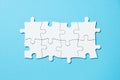 Eight pieces white jigsaw puzzle on blue background for business presentation