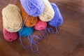 Eight Skeins of Yarn with Lavender Yarn Spellng Yarn from Above Royalty Free Stock Photo