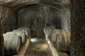 Eight wooden barrles in the cellar of a syngoge in Pitigliano