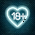 Eighteen plus neon sign on brick wall background. Royalty Free Stock Photo
