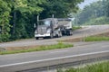 Eighteen Wheeler Travels On Rural Secondary Highway