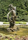 Eighteenth-century basin with fountain statue in the Italian garden of the Villa Carlotta in Tremezzo.