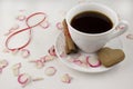 Eighth March, a cup of coffee, rose petals chocolate