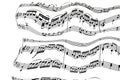 Cheerful notes on musical rulers with violin bass keys flats and bacon on a white sheet