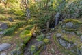 Monument with stone carved statues beside the Amida-do stairway at Eikando Zenrinji Temple. Kyoto, Japan.