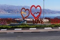 Funny city sculpture about love in different languages stands on the street
