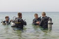 Eilat, Israel - May 2018: Scuba diving course. Men with breathing apparatus in sea