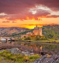 Eilean Donan Castle against sunset in Highlands of Scotland Royalty Free Stock Photo