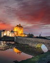 The Eilean Donan Castle with colorful sunset, Highlands of Scotland Royalty Free Stock Photo