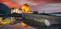 The Eilean Donan Castle with colorful sunset, Highlands of Scotland Royalty Free Stock Photo