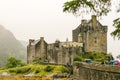 Eilean Donan castle in Highlands mountains in Scotland