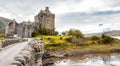 Eilean Donan castle panorama with Scottish flag Royalty Free Stock Photo