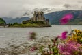 Eilean Donan Castle Sotland landmark Scottish old fortress clouds Royalty Free Stock Photo