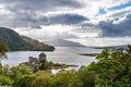 Eilean Donan castle under a dramatic cloudscape Royalty Free Stock Photo