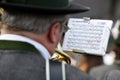 A musician with a sheet of music