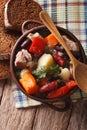 Eintopf with meat, sausages and vegetables closeup. vertical top Royalty Free Stock Photo