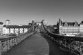 Eiserner Steg, famous iron footbridge crosses river Main in Frankfurt with skyline Royalty Free Stock Photo