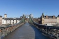 Eiserner Steg, famous iron footbridge crosses river Main in Frankfurt with skyline i Royalty Free Stock Photo