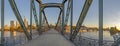 Eiserner Steg, famous iron footbridge crosses river Main in Frankfurt with skyline in morning light Royalty Free Stock Photo