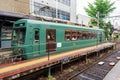 Eizan Electric Railway train stops at the Demachiyanagi Station. Kyoto, Japan. Royalty Free Stock Photo