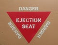 Ejection seat warning red triangle sign Royalty Free Stock Photo