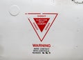 Ejection seat warning sign on the fuselage of an old aircraft Royalty Free Stock Photo
