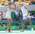 Ekaterina Makarova (L) and Elena Vesnina of Russia in action during women's doubles final of the Rio 2016