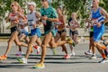 group male and female runners athletes run in Europe-Asia Marathon