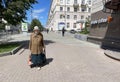 Ekaterinburg, Russia, July, 05, 2021. Elderly woman walks along Yakov Sverdlov Street in Yekaterinburg in the summer