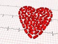 Ekg paper and red tablets heart Royalty Free Stock Photo