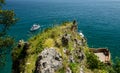 El Caballo lighthouse with touristic boat in Cantabria, Spain Royalty Free Stock Photo