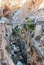 El Caminito del Rey, Spain, old narrow dangerous metal bridge spread between rocks over the precipice at El Chorro gorge