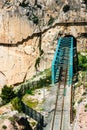 El Caminito del Rey with train iron bridge in Malaga, Spain.