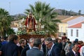 Catholic believers carrying the stature of the saint Catherine.