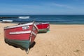 Two colorful traditional fishing boats in a beach near the city of El Jadida in the Atlantic coast of Morocco Royalty Free Stock Photo