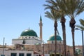 El-Jazzar Mosque White Mosque with dome, minaret and palm trees in Acre Old City, Israel