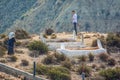 El Jebha, Morocco - October 19, 2013. Muslim family visiting graveyard