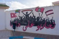 6.11.23 El Jem, Tunisia: Street art Political Graffiti on walls in City of El Jem Tunisia.