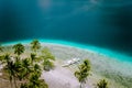 El Nido, Palawan, Philippines. Aerial drone view of tourist island hopping boats moored at tropical Ipil beach on