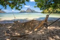 El Nido, Palawan, Philippines. A bamboo hammock in the shade with beautiful tropical cadlao island in morning light the Royalty Free Stock Photo